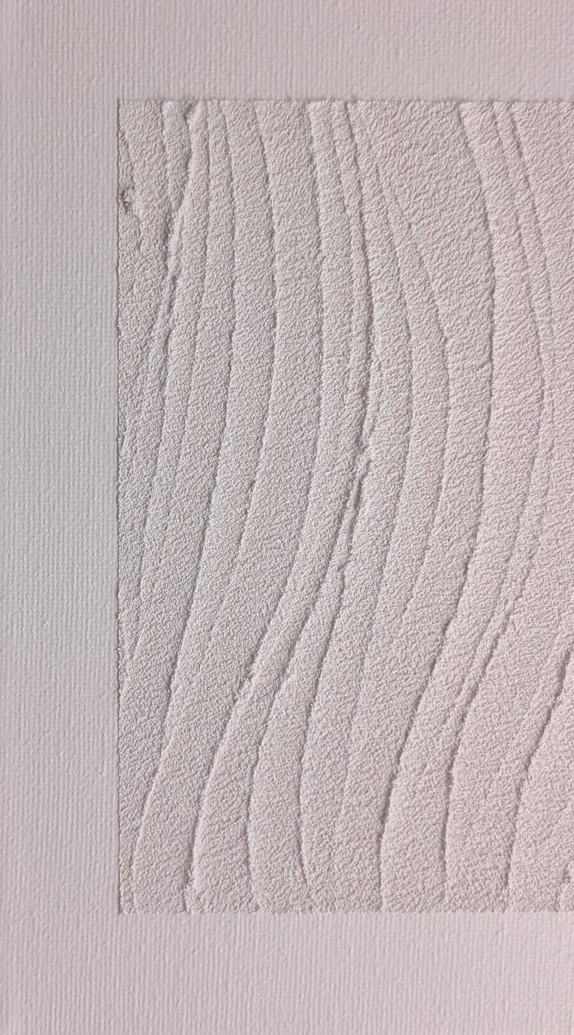 Textured wall panel with wavy pattern on a light gray background